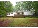 Charming home with a cozy front porch decorated with patriotic bunting at 1789 Paris Dr, Conover, NC 28613