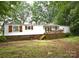 Charming home with a cozy front porch decorated with patriotic bunting at 1789 Paris Dr, Conover, NC 28613