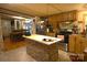 Charming kitchen with stone island, stainless steel appliances and breakfast bar seating at 1789 Paris Dr, Conover, NC 28613