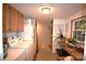 Laundry room with appliances, storage, and natural light at 1789 Paris Dr, Conover, NC 28613
