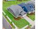 Aerial view of new construction home, showcasing the landscaping and roofline at 1818 Winding Mist Dr, Belmont, NC 28012