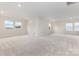 Spacious bonus room with recessed lights, carpet, and multiple windows at 1818 Winding Mist Dr, Belmont, NC 28012
