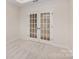 Well-lit home office features double doors, plush carpet and overhead lighting at 1818 Winding Mist Dr, Belmont, NC 28012