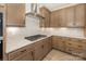 Stylish kitchen features stainless steel range and appliances, granite countertops, and ample cabinet space at 1818 Winding Mist Dr, Belmont, NC 28012