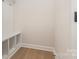Efficient mudroom with built-in bench, storage cubbies, and convenient hooks at 1818 Winding Mist Dr, Belmont, NC 28012