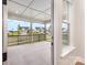 Covered patio overlooking a well-maintained backyard and neighborhood homes at 1818 Winding Mist Dr, Belmont, NC 28012