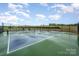 Community tennis courts featuring well-maintained playing surface at 1818 Winding Mist Dr, Belmont, NC 28012