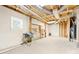 A functional basement space featuring a workbench, shelving, and a window for natural light at 201 Forest Rd, Taylorsville, NC 28681