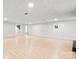 Large finished basement area features recessed lighting and light wood floors at 201 Forest Rd, Taylorsville, NC 28681