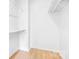 The interior of this closet features light wood floors, white walls and shelving, and ample storage space at 201 Forest Rd, Taylorsville, NC 28681