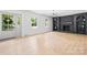 Bright living room with a brick fireplace, white walls, and views to the outside at 201 Forest Rd, Taylorsville, NC 28681