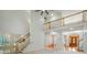 Bright foyer with staircase and balcony, providing an inviting view of the home's entrance at 201 Limerick Dr, Matthews, NC 28104