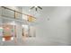 Bright living room with high ceilings and balcony, offering an open and airy feel at 201 Limerick Dr, Matthews, NC 28104