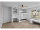 Bedroom featuring a built in bunk, desk, and bright window at 2021 Tarzi Ln, Charlotte, NC 28215