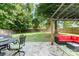 Backyard patio featuring outdoor dining and lounge seating, perfect for entertaining at 2206 Waters Trail Dr, Charlotte, NC 28216
