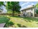 Spacious backyard with patio, seating, and lush lawn perfect for outdoor activities at 2206 Waters Trail Dr, Charlotte, NC 28216