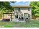 Backyard view featuring a patio with outdoor seating and a built-in grill area at 2206 Waters Trail Dr, Charlotte, NC 28216