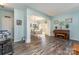 Spacious living room with hardwood floors, complemented by elegant decor and neutral wall paint at 2206 Waters Trail Dr, Charlotte, NC 28216