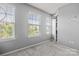 Neutral bedroom includes large windows for natural light and a closet at 2522 Richland Balsam Dr # 450, Fort Mill, SC 29715