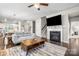Cozy living room with fireplace, plush seating, and hardwood floors at 2522 Richland Balsam Dr # 450, Fort Mill, SC 29715
