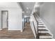 Inviting entryway with hardwood floors, staircase, and neutral paint, creating a warm ambiance at 3053 Riker St, Clover, SC 29710