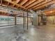 Spacious basement with a garage offers ample storage and possible workshop space at 3225 Mill Pond Rd, Charlotte, NC 28226