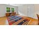 Bright bedroom with natural light and hardwood floors is the perfect room for your home office at 3225 Mill Pond Rd, Charlotte, NC 28226