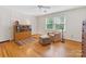 Bright bedroom with natural light, hardwood floors, and neutral colors is move-in ready at 3225 Mill Pond Rd, Charlotte, NC 28226