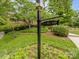 Street view showcasing the home's address and well-maintained lawn at 3225 Mill Pond Rd, Charlotte, NC 28226