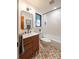 Updated bathroom features stylish vanity, tub and shower with modern fixtures at 3248 Lake Shore S Rd, Denver, NC 28037