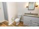 Bathroom showcasing granite vanity, toilet, and shower with tile surround at 3248 Lake Shore S Rd, Denver, NC 28037