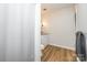 Bathroom with shower, commode, and vanity with granite counter and white cabinets at 3248 Lake Shore S Rd, Denver, NC 28037