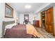 Bedroom with wood floors, natural light, and classic wood accents and finishes at 3248 Lake Shore S Rd, Denver, NC 28037