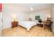 Bedroom featuring neutral walls, wood floors, ceiling fan, a single window, and a simple layout at 3248 Lake Shore S Rd, Denver, NC 28037
