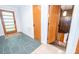 Spacious entryway with tile floors and stylish wooden door at 3248 Lake Shore S Rd, Denver, NC 28037
