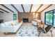 Cozy living room with a brick fireplace, hardwood floors, and comfortable seating arrangements at 3248 Lake Shore S Rd, Denver, NC 28037