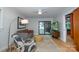 Inviting living room with plush seating and sliding glass doors that lead to a deck at 3248 Lake Shore S Rd, Denver, NC 28037