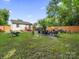 Spacious backyard with a wood privacy fence and patio set at 339 Arnold St, Rock Hill, SC 29730