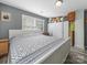 This bedroom is decorated with neutral paint and wood-look flooring at 339 Arnold St, Rock Hill, SC 29730