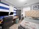 Bedroom with wood-look floors, an office area, and a double-size bed at 339 Arnold St, Rock Hill, SC 29730