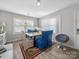 View of dining area featuring dining table set, modern furniture, and natural lighting at 339 Arnold St, Rock Hill, SC 29730