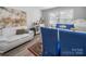 Open concept dining room with a plush sofa, area rug, and an ornate buffet at 339 Arnold St, Rock Hill, SC 29730