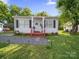 Charming single-story home with a well-maintained yard and a welcoming front porch area at 339 Arnold St, Rock Hill, SC 29730