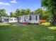 Well maintained front yard of a single-story home, and well manicured lawn at 339 Arnold St, Rock Hill, SC 29730