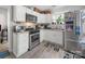 Bright kitchen with stainless steel appliances, white cabinets, and a stylish backsplash at 339 Arnold St, Rock Hill, SC 29730