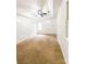 This vacant bedroom features a ceiling fan and plush carpet at 3430 Fincher Blvd, Charlotte, NC 28269
