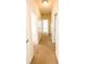 Hallway showcasing carpet flooring, neutral wall paint, and doors that provide access to other rooms at 3430 Fincher Blvd, Charlotte, NC 28269