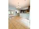 Open kitchen featuring stainless appliances, breakfast bar, and an easy view to the living room and dining area at 3430 Fincher Blvd, Charlotte, NC 28269