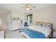 Bright bedroom offers natural light, ceiling fan, and ample storage at 3721 Conway Ave, Charlotte, NC 28209