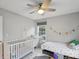 bedroom with crib, twin bed, and plenty of natural light at 3721 Conway Ave, Charlotte, NC 28209
